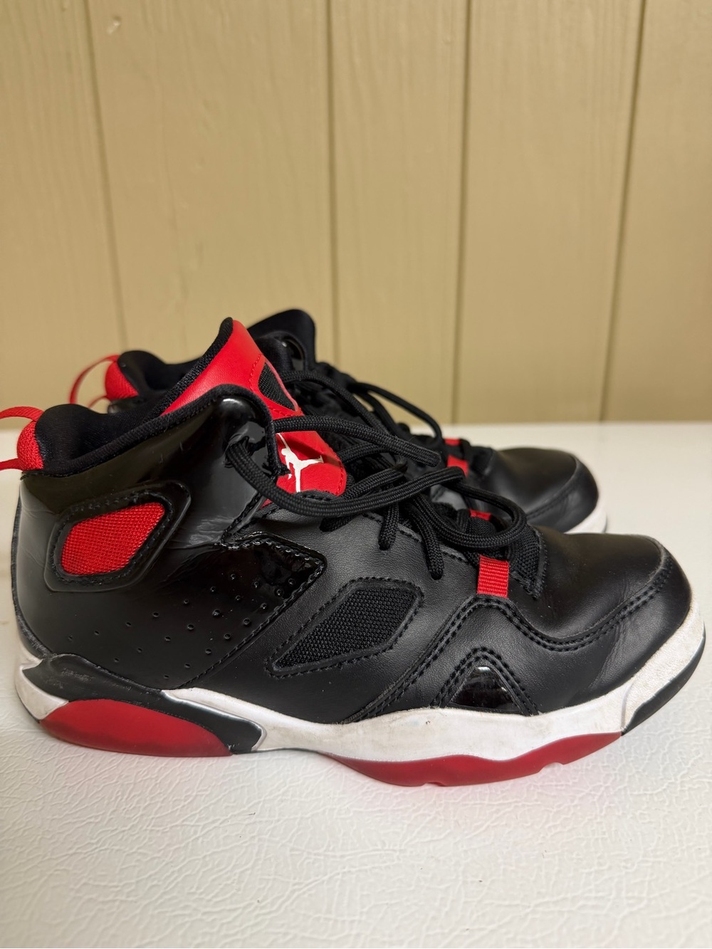 Jordan Kids Black and Red High-Top Sneakers